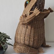 Vintage rattan frog magazine rack