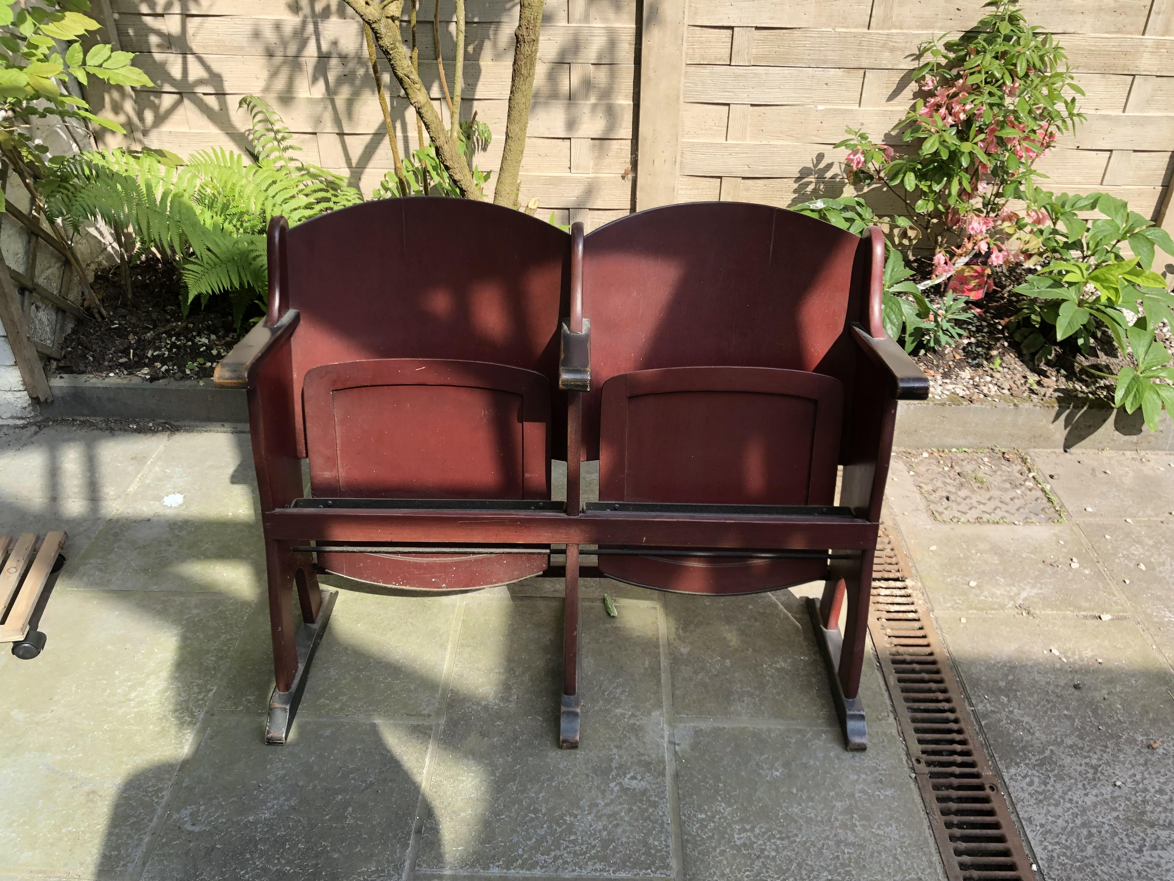 Folding seat two folding chairs from an old theatre