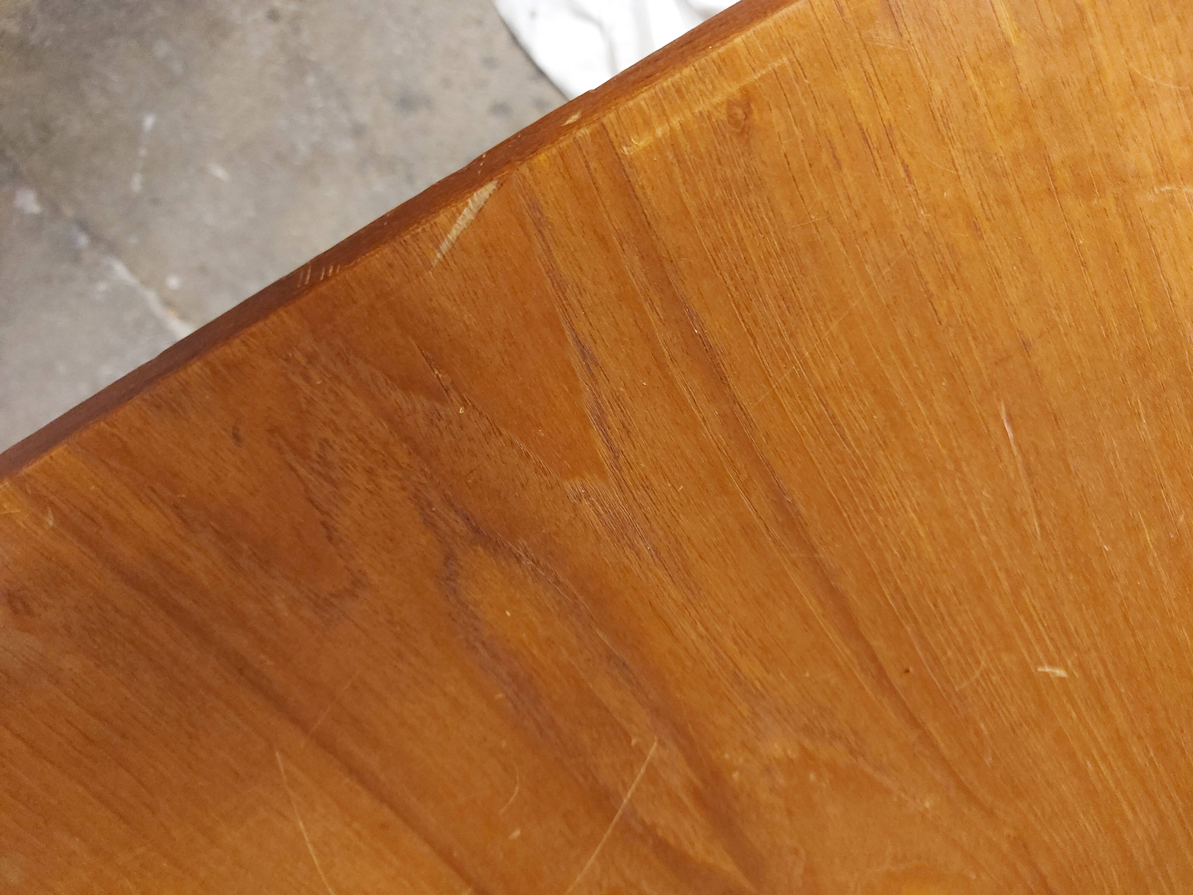 Scandinavian teak table with built-in extension