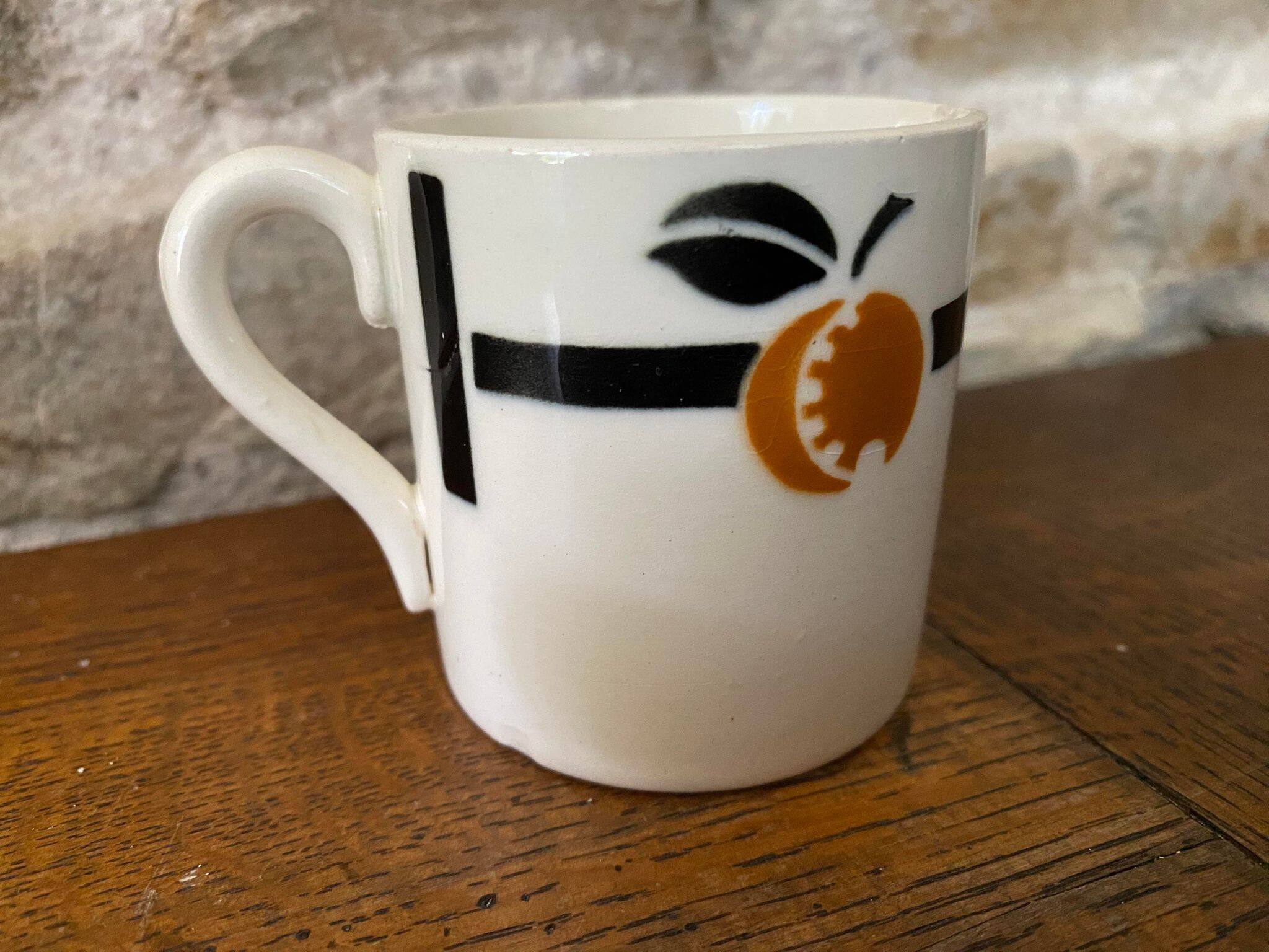 Cup and saucer in Iron Earth Badonviller apricot décor