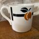 Cup and saucer in Iron Earth Badonviller apricot décor