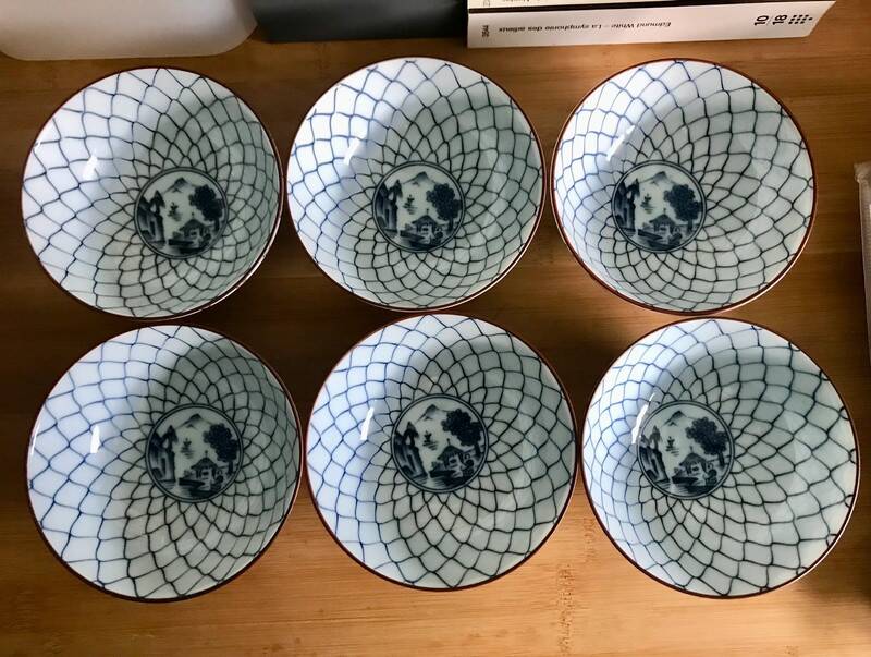 6 white and blue japanese porcelain bowls with mountain decoration