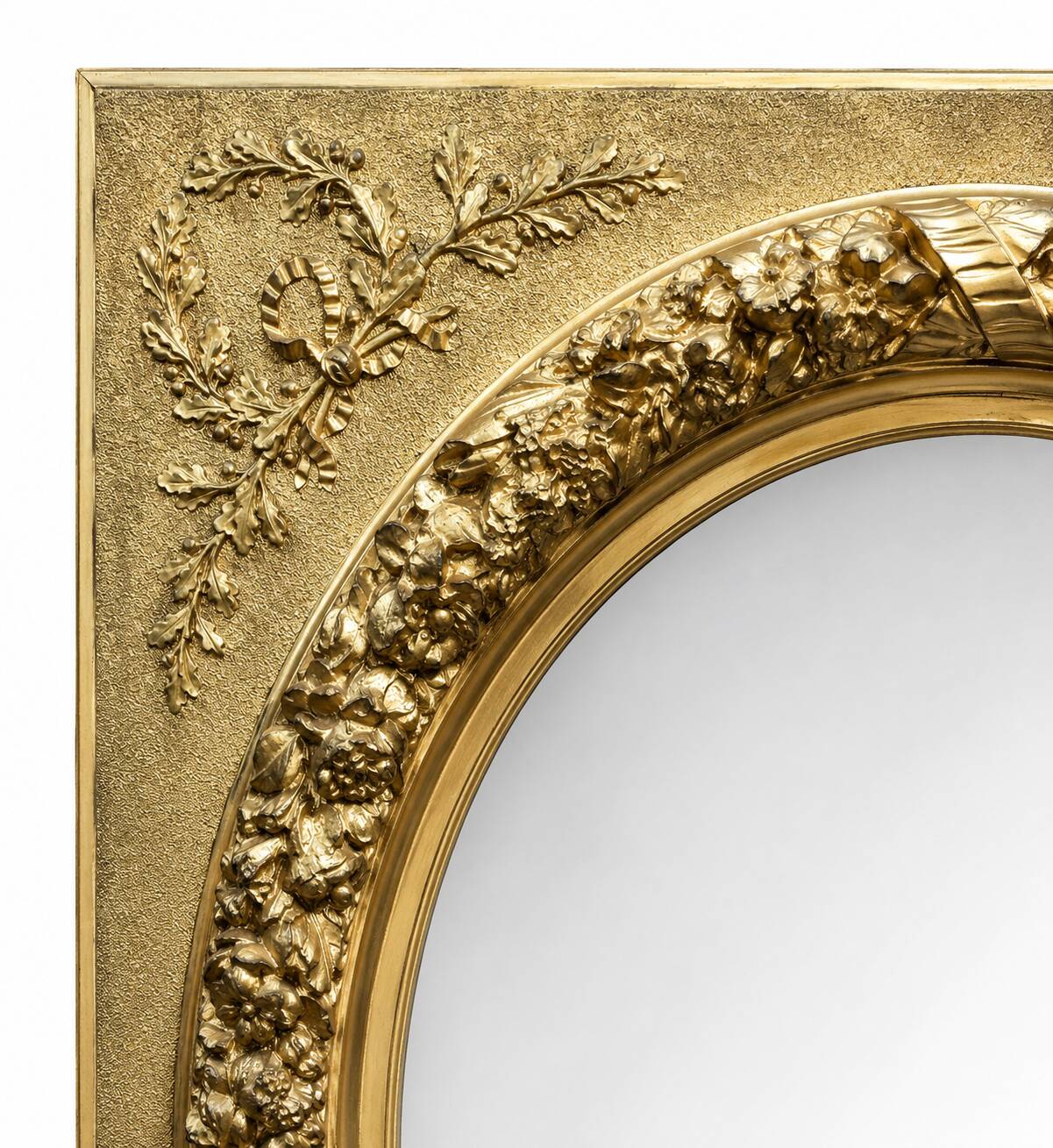 Large Louis XVI style mirror in gilded wood and composition – Early 20th century.