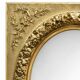 Large Louis XVI style mirror in gilded wood and composition – Early 20th century.