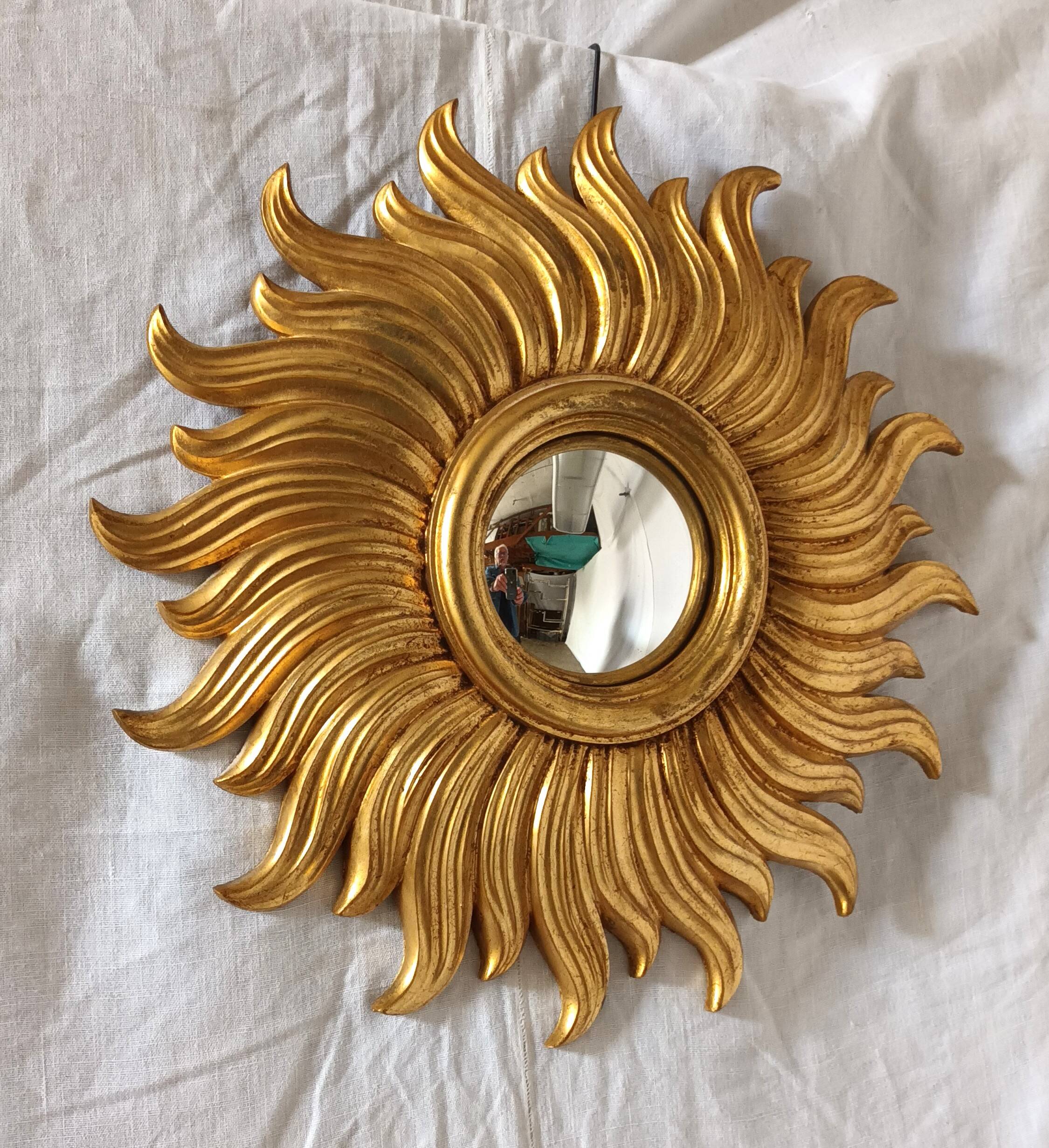 Miroir soleil en bois doré des années 90