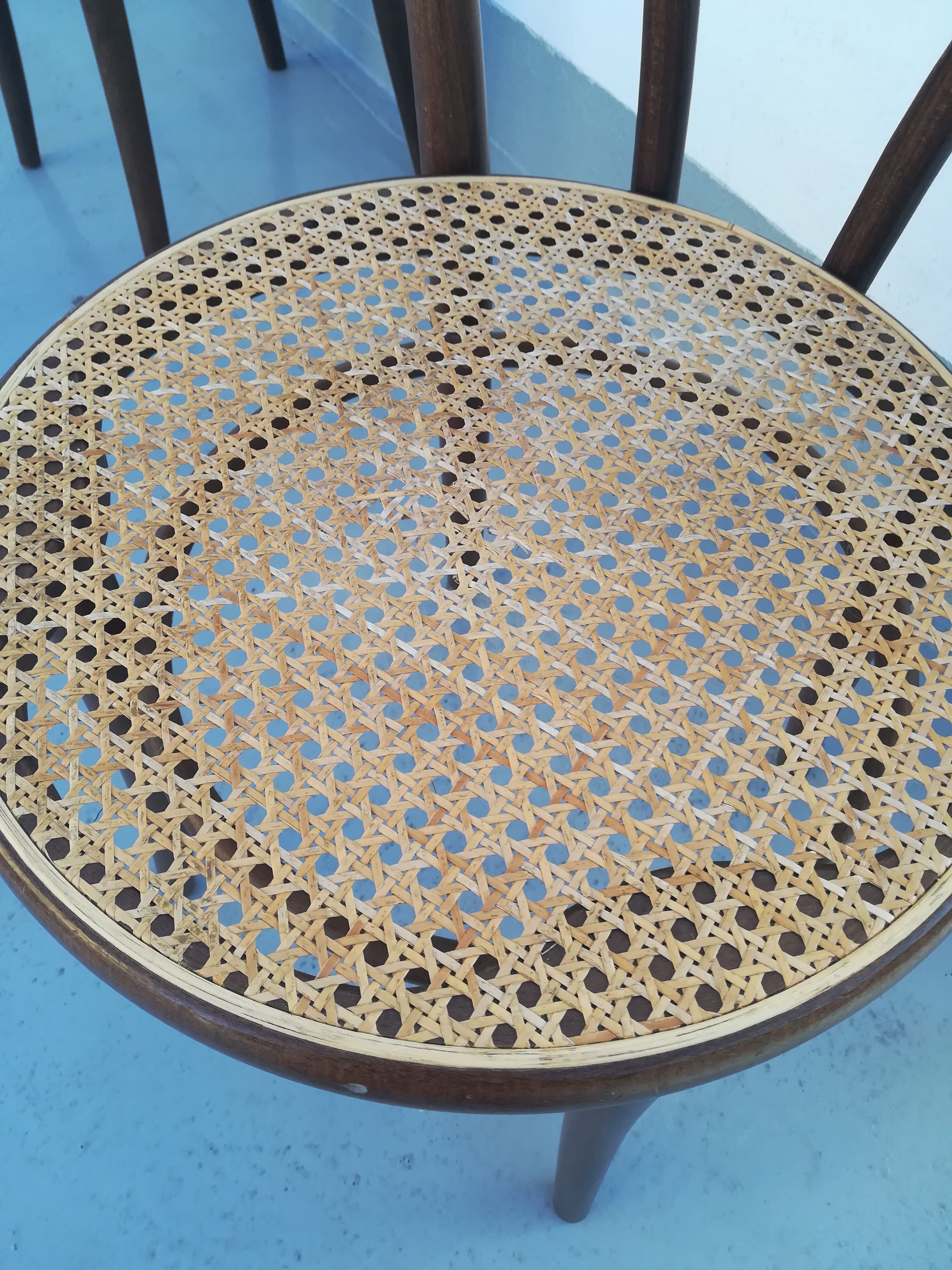 2 Curved wooden bistro chairs