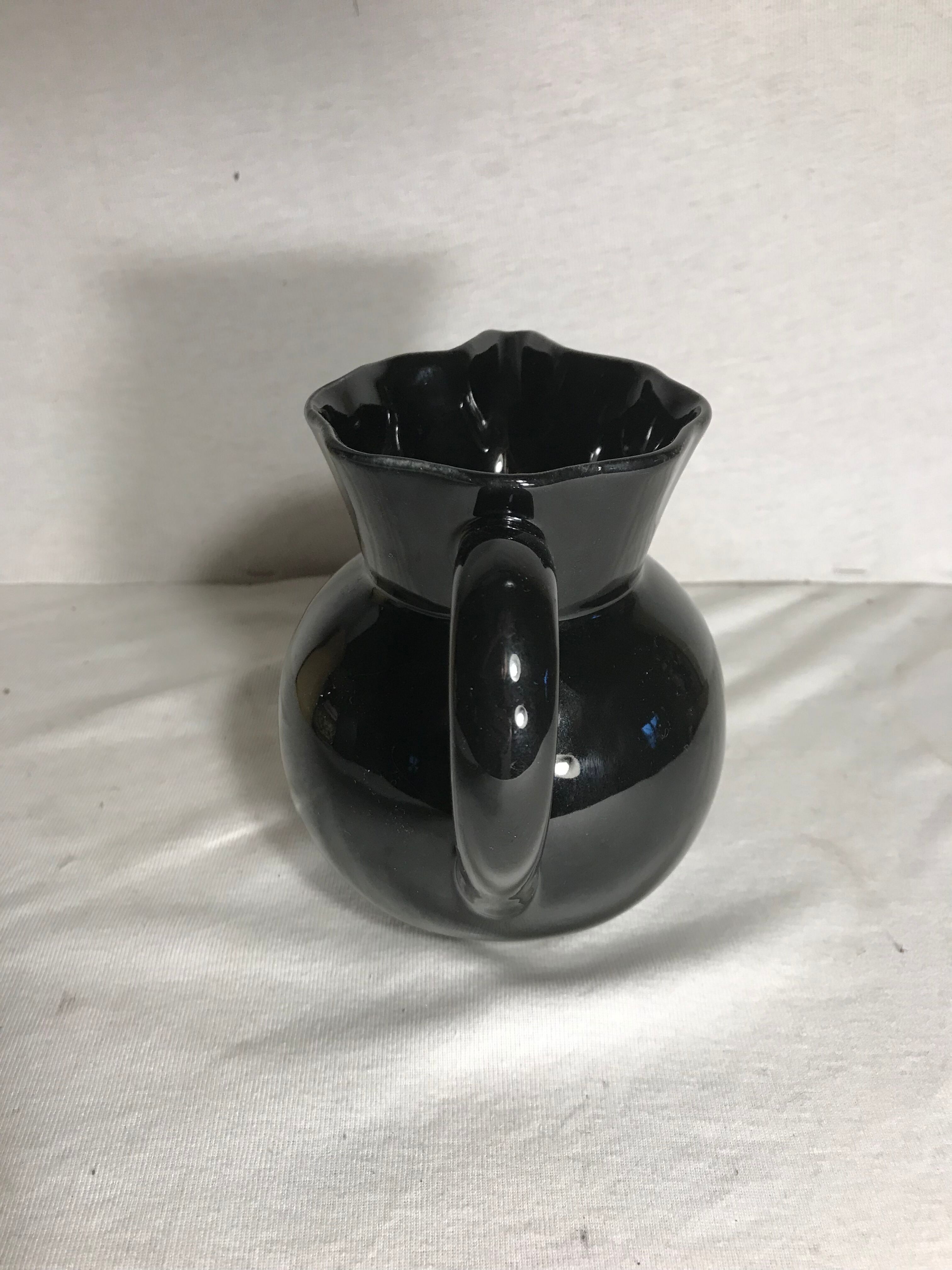 Former enamelled ceramic black pitcher 70s