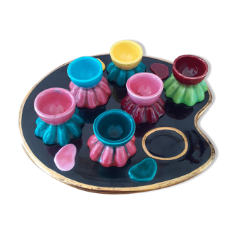 6 vintage cockroaches and their pallet-shaped tray