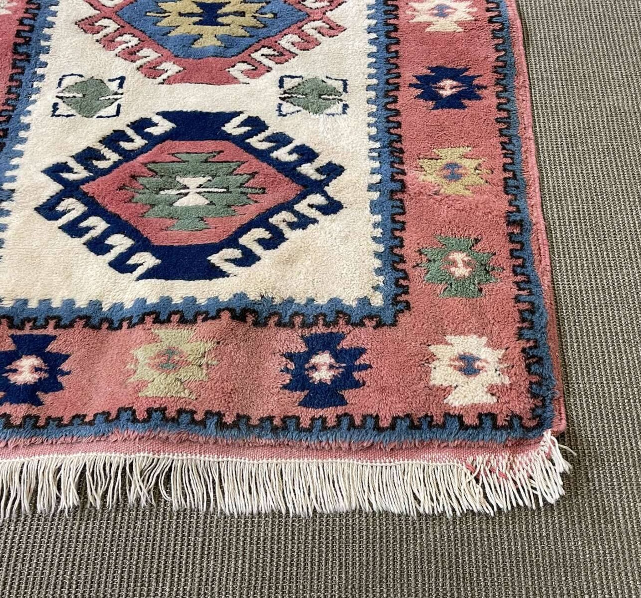 Handmade wool Oriental rug - 1.40m x 0.85m