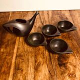 Black enameled ceramic service.