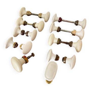 Set of 8 pairs of door handles and 2 window handles, in porcelain.