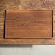Rectangular solid teak tray with carved edges 40x25