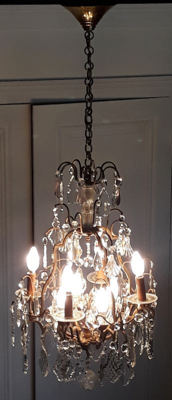 Louis XV-style bronze cage and crystal Baccarat chandelier
