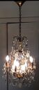 Louis XV-style bronze cage and crystal Baccarat chandelier