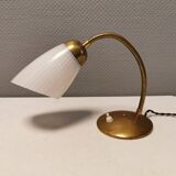 Beautiful table lamp, estimated from the 1950-60s. Made of metal, brass and glass.