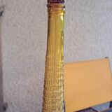 Glass bottle from Empoli, Italy, amber color.