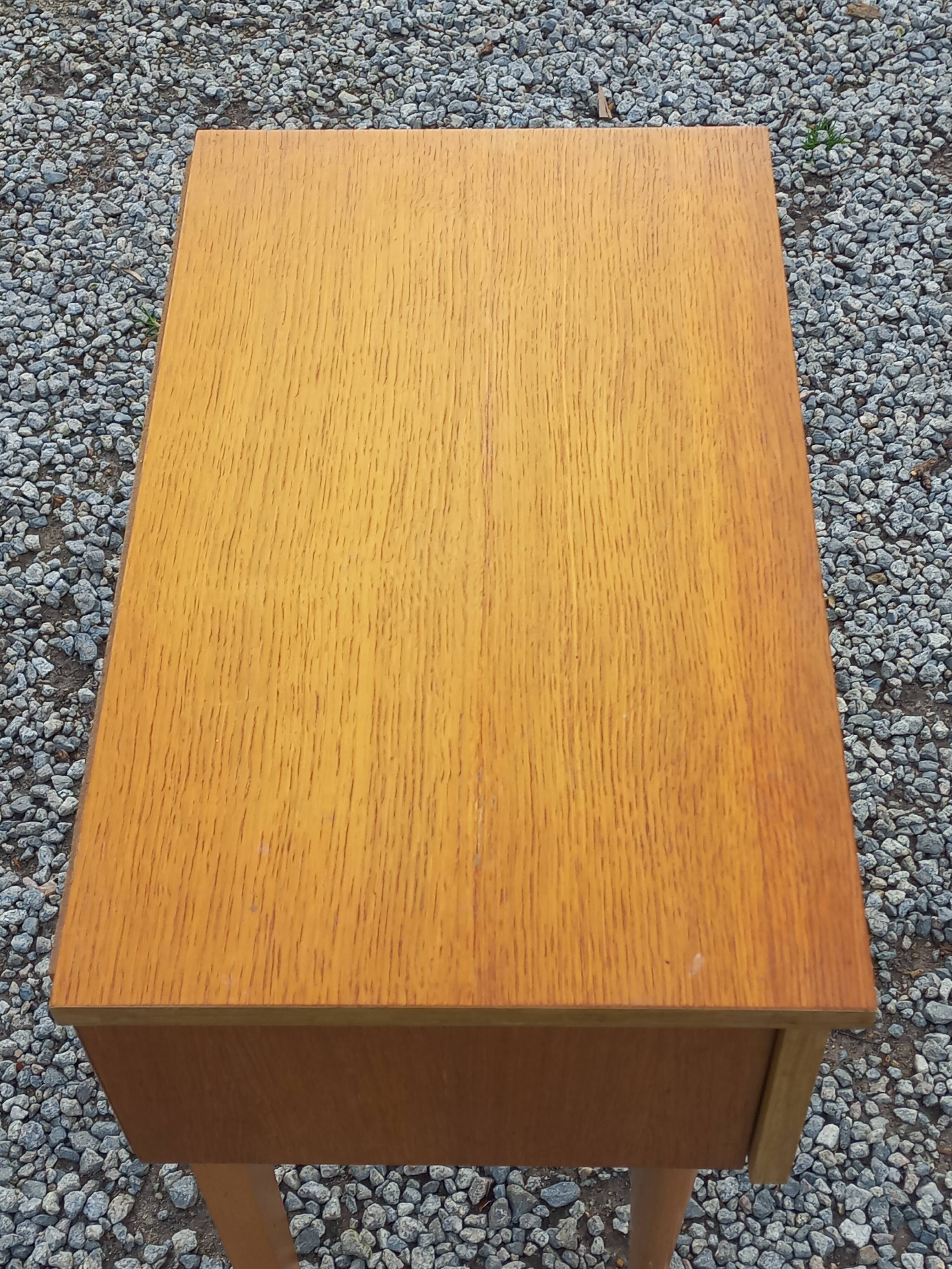 Vintage 1950s bedside table in blond oak with conical legs