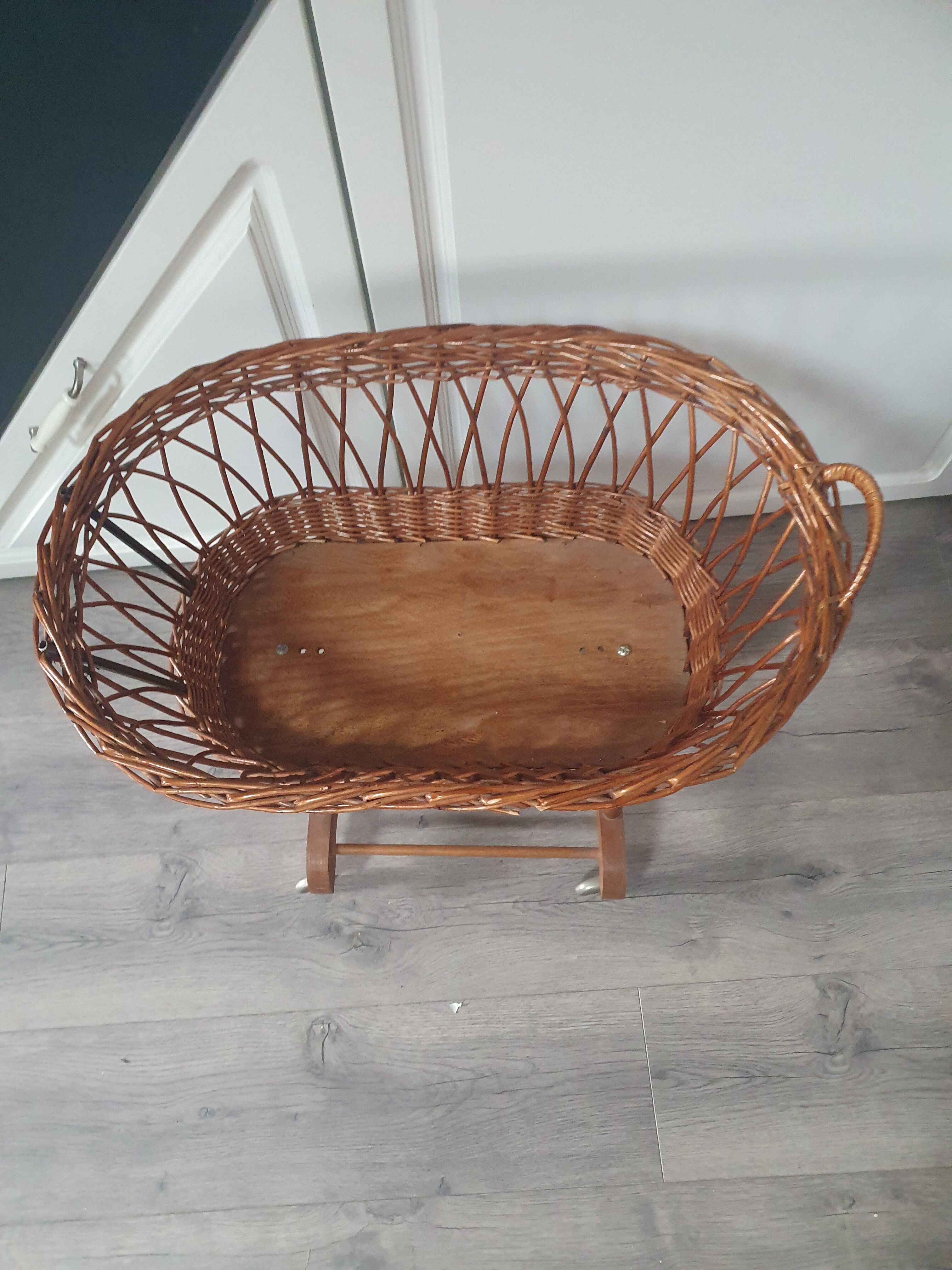 Old vintage rattan crib on wheels, missing a handle 60 by 40cm high 52cm for doll