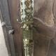 Coat holder on onyx and gold metal foot