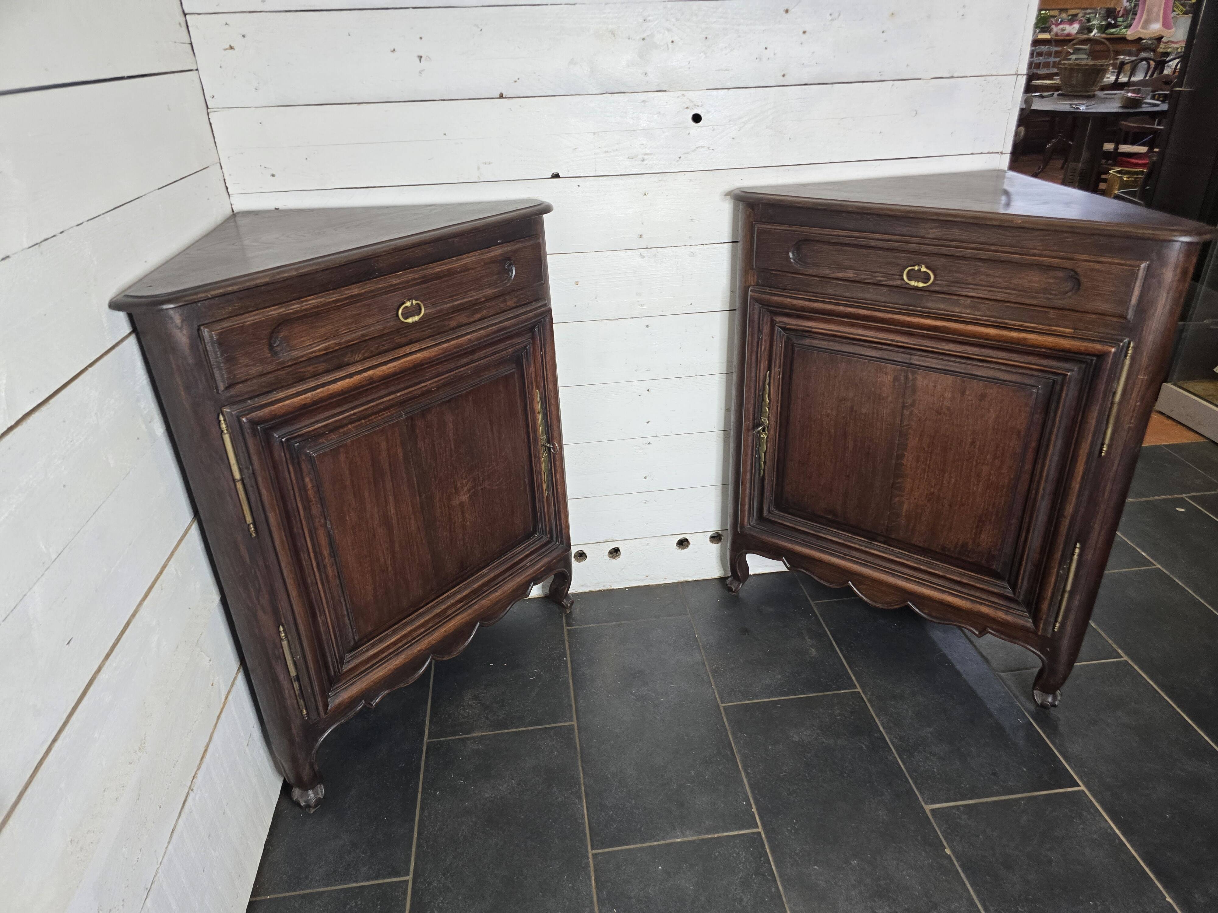 Pair of oak corner cabinets