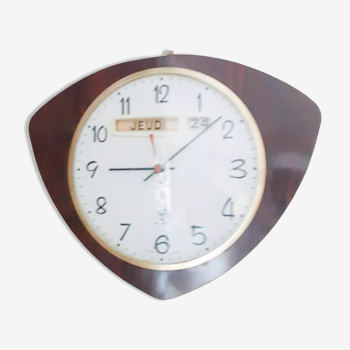 Pendule calendrier en formica marron et dorée  ,vintage , années 50, fonctionnelle