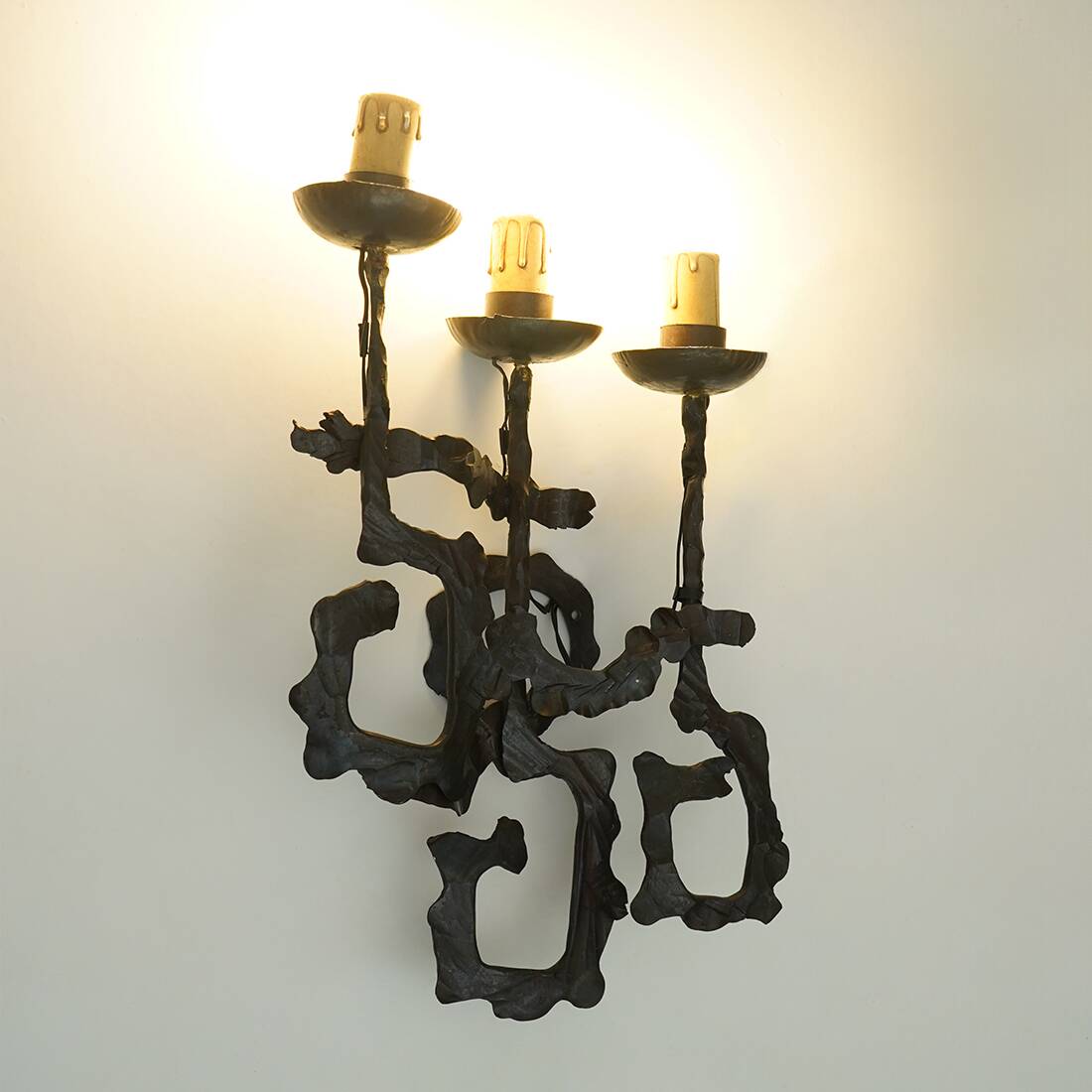 Pair of Brutalist wrought iron wall lamps, 1960s