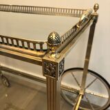 Table de style néo classique en métal argenté et doré et verre