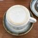 Mugs with saucers