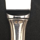 12 silver metal knives