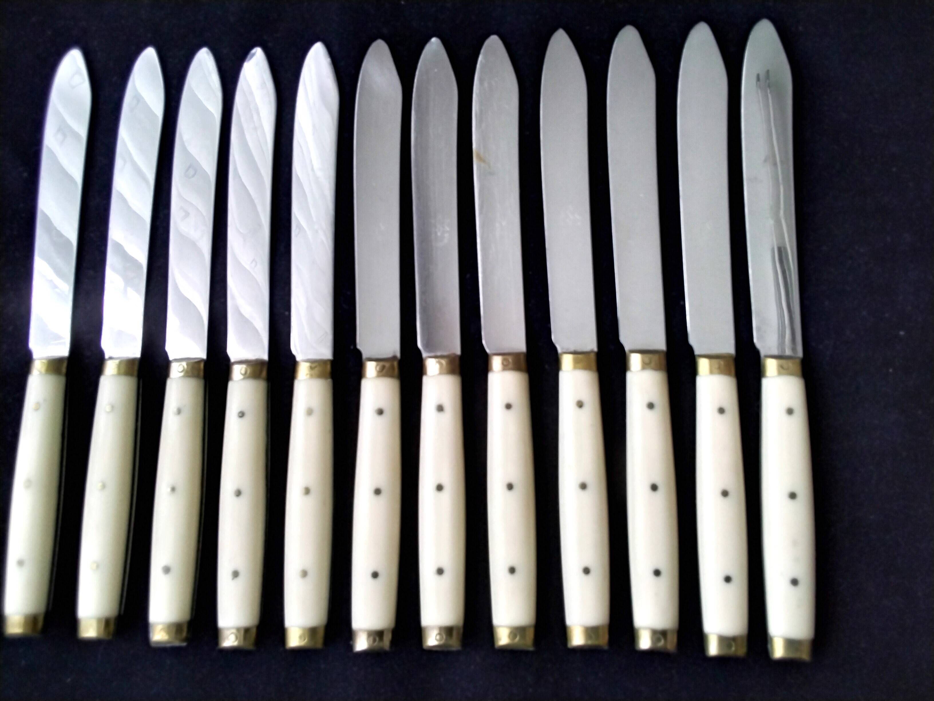 12 vintage bakelite brass and stainless steel table knives