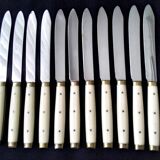 12 vintage bakelite brass and stainless steel table knives