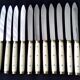 12 vintage bakelite brass and stainless steel table knives