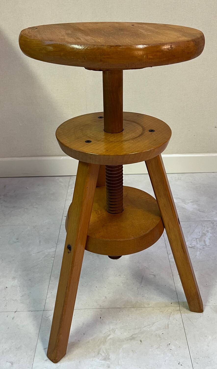 Adjustable and swivel wooden stool