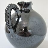 Black pearl glaze ceramic pitcher by Reinhold Rieckmann signed