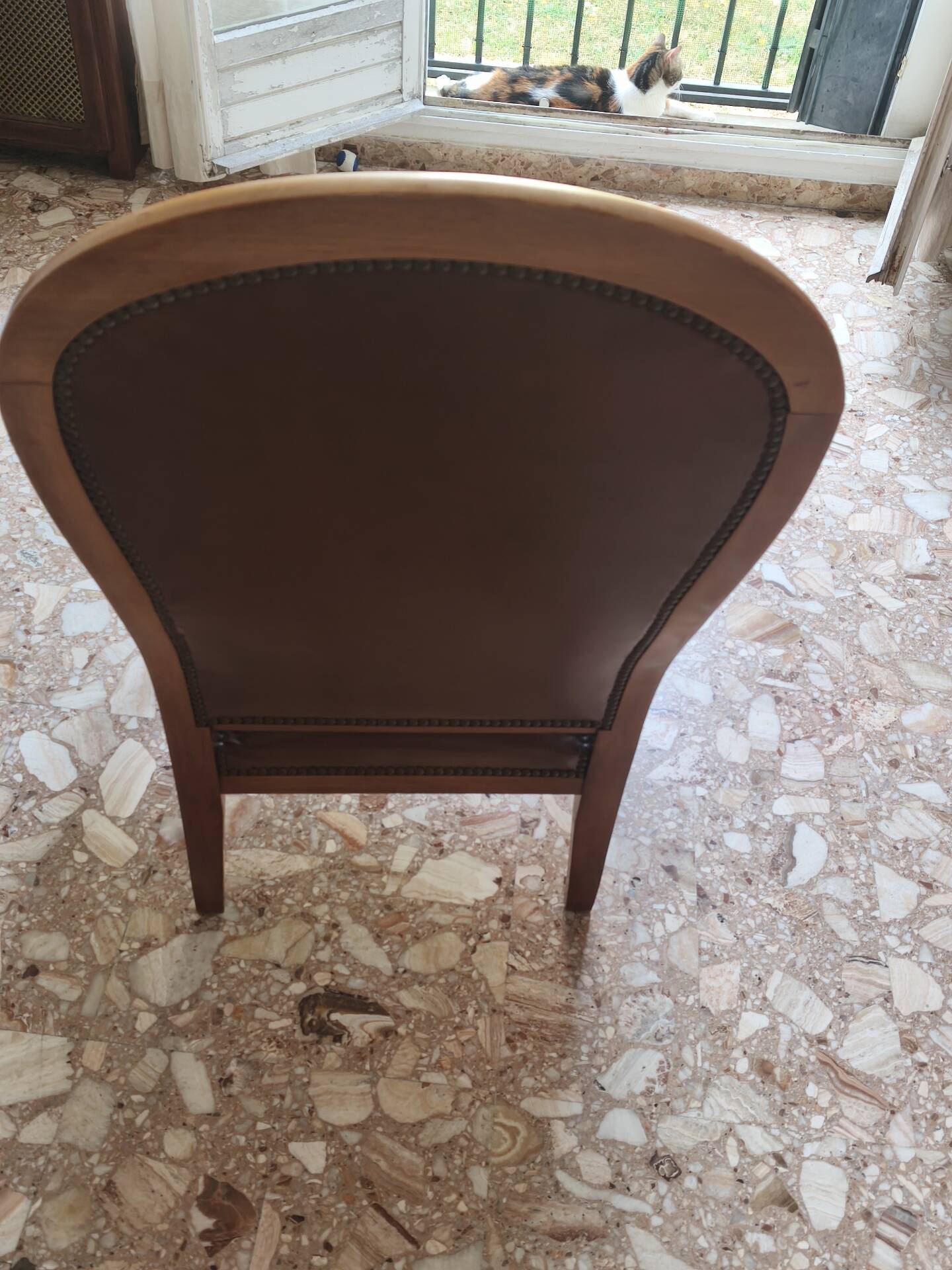 Leather armchair signed