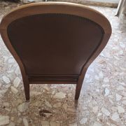 Leather armchair signed