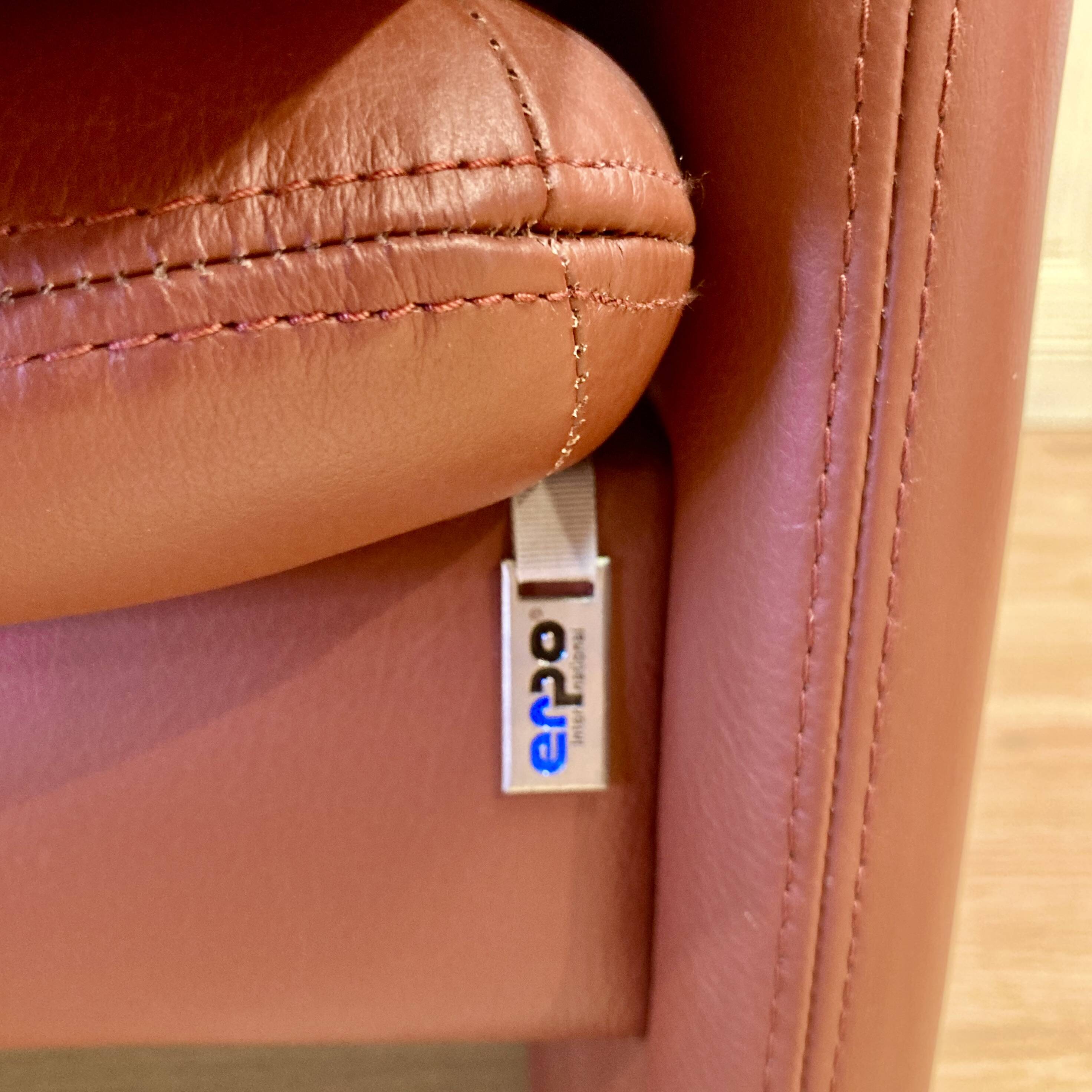 Pair of "Erpo" designer adjustable leather armchairs.