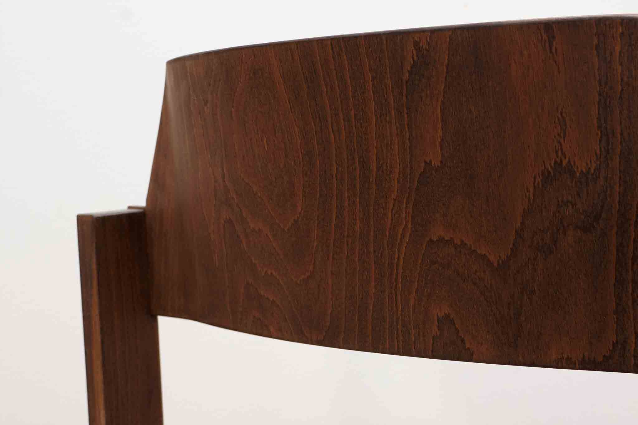 Scandinavian style ebony chair upholstered in gray