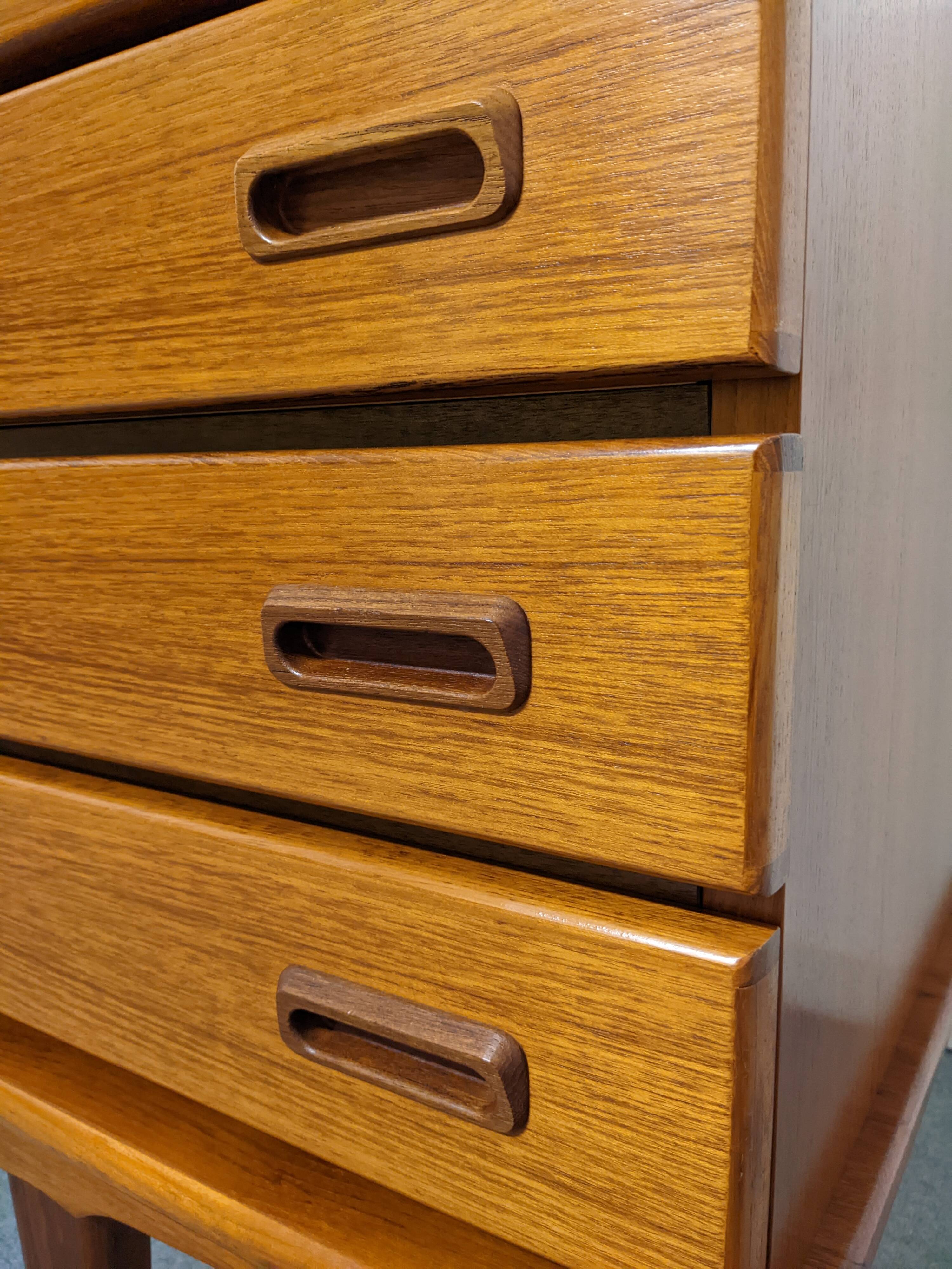 High sideboard, display cabinet and secretary, Scandinavian in teak, France around 1960.