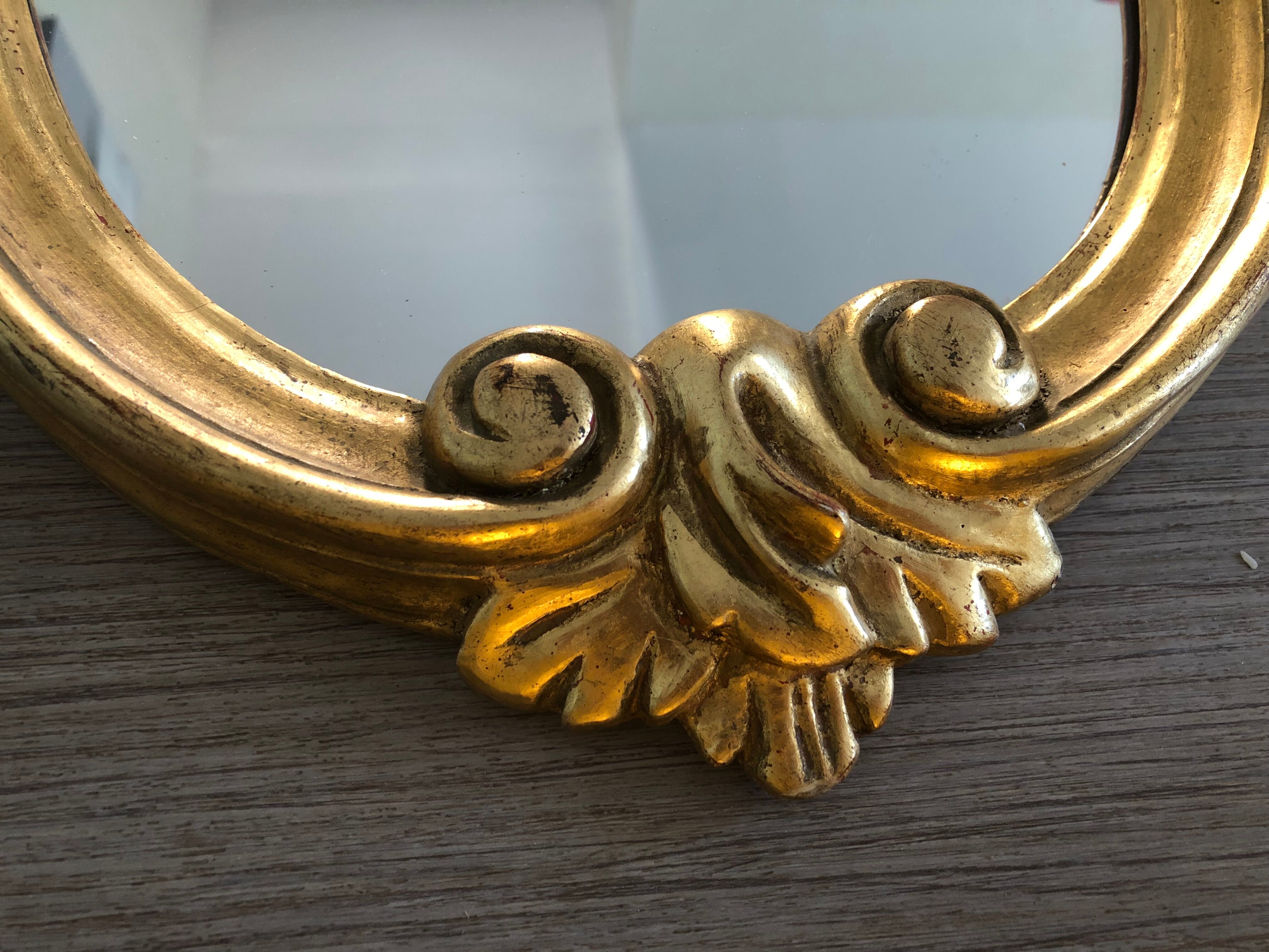 Golden baroque mirror with its 54x86cm tablet