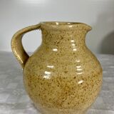 Turned and glazed stoneware wine pitcher