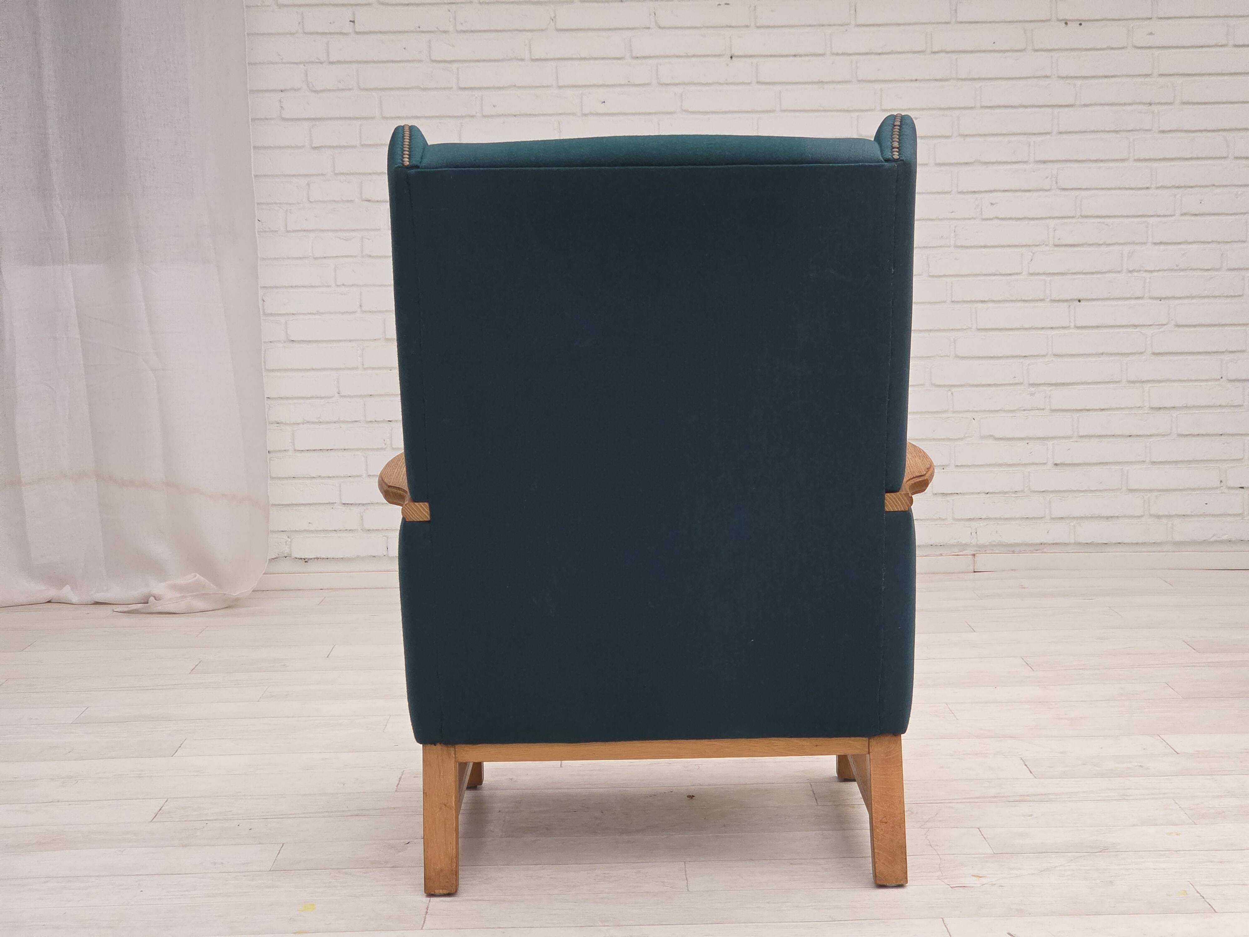 1970s, Danish highback armchair, furniture wool, solid oak wood.