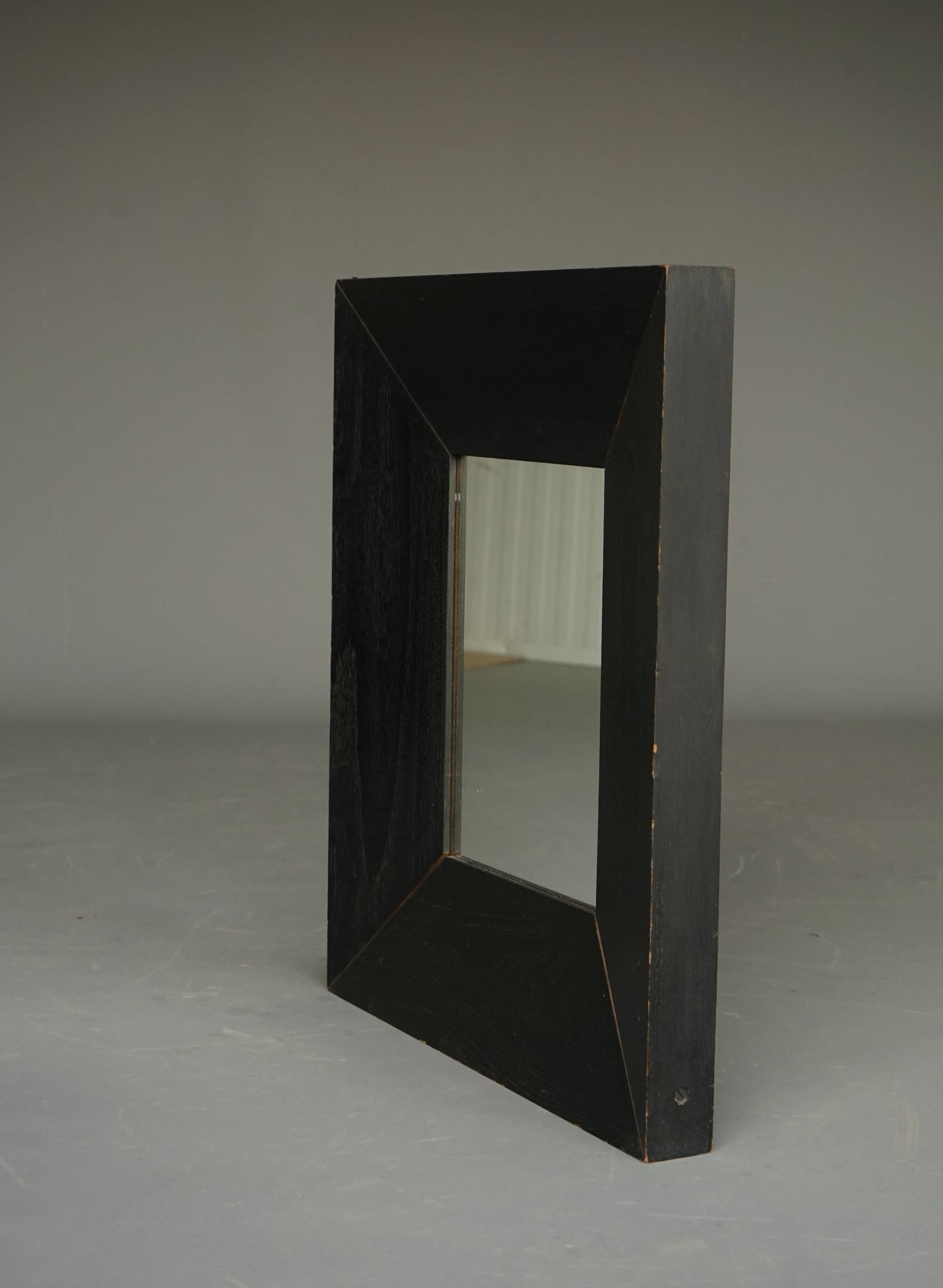Thick framed vintage wall mirror