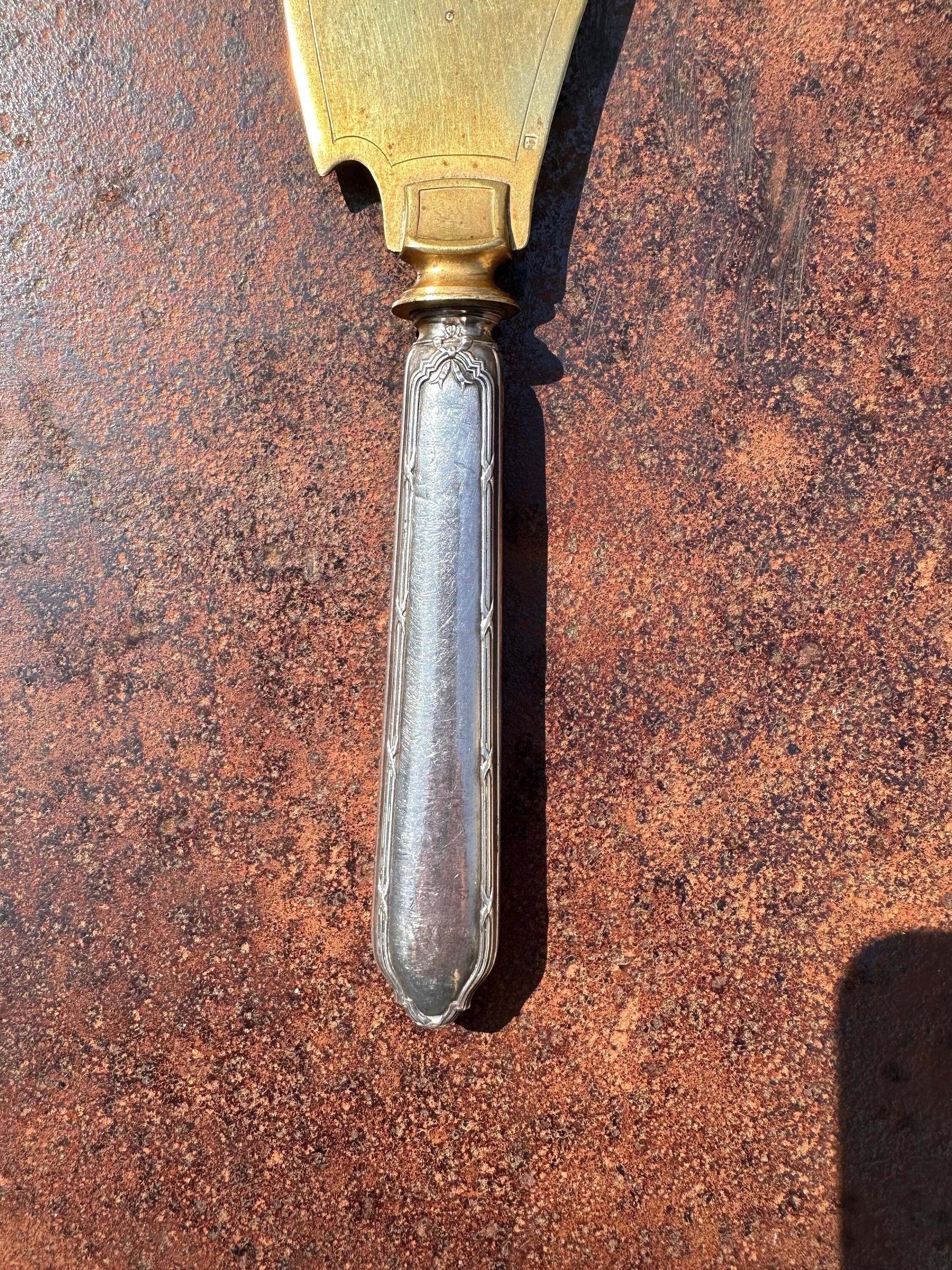 Silver-handled pie server Minerve, golden blade, Louis style.