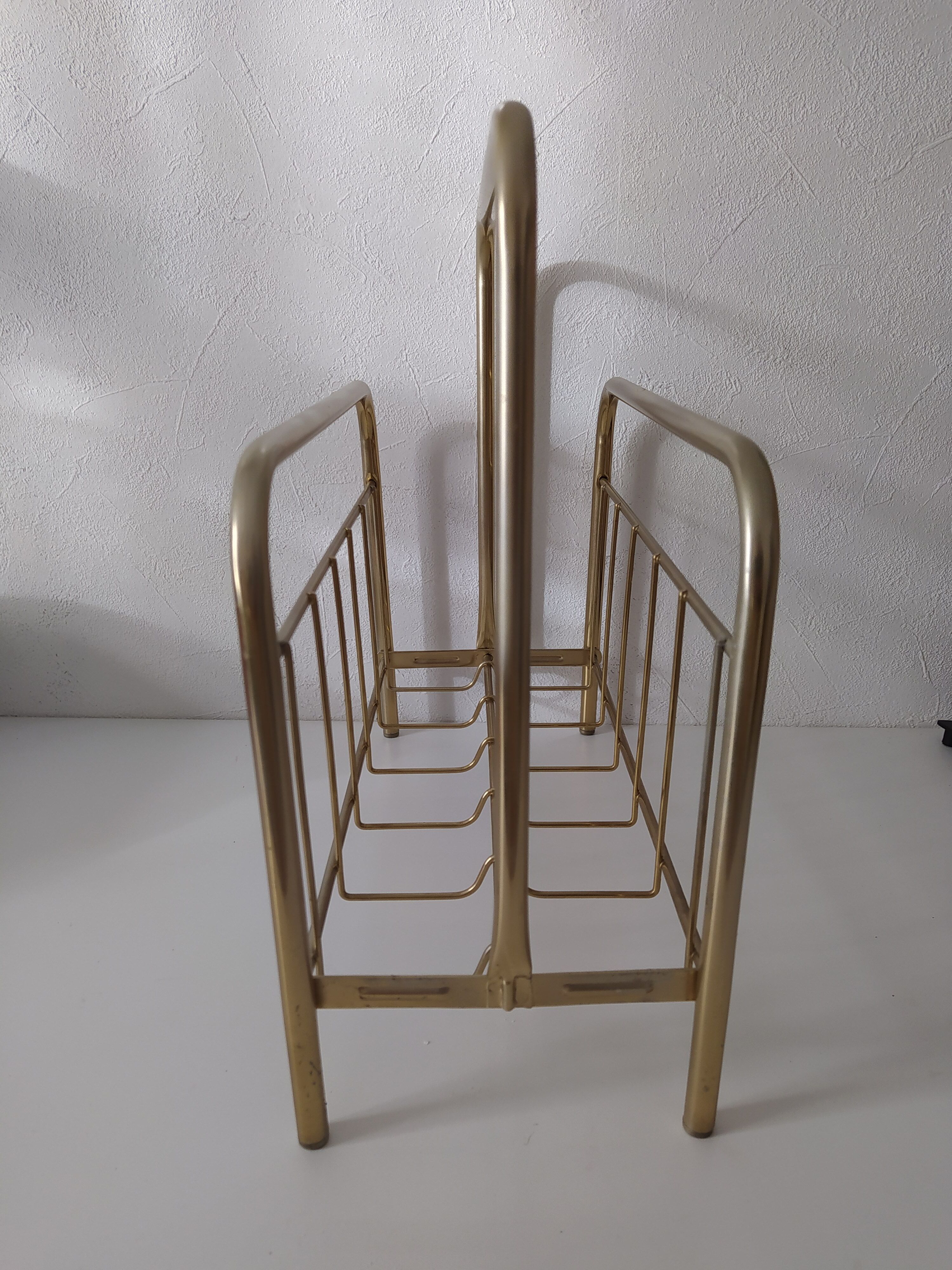 Vintage magazine holder in golden brass