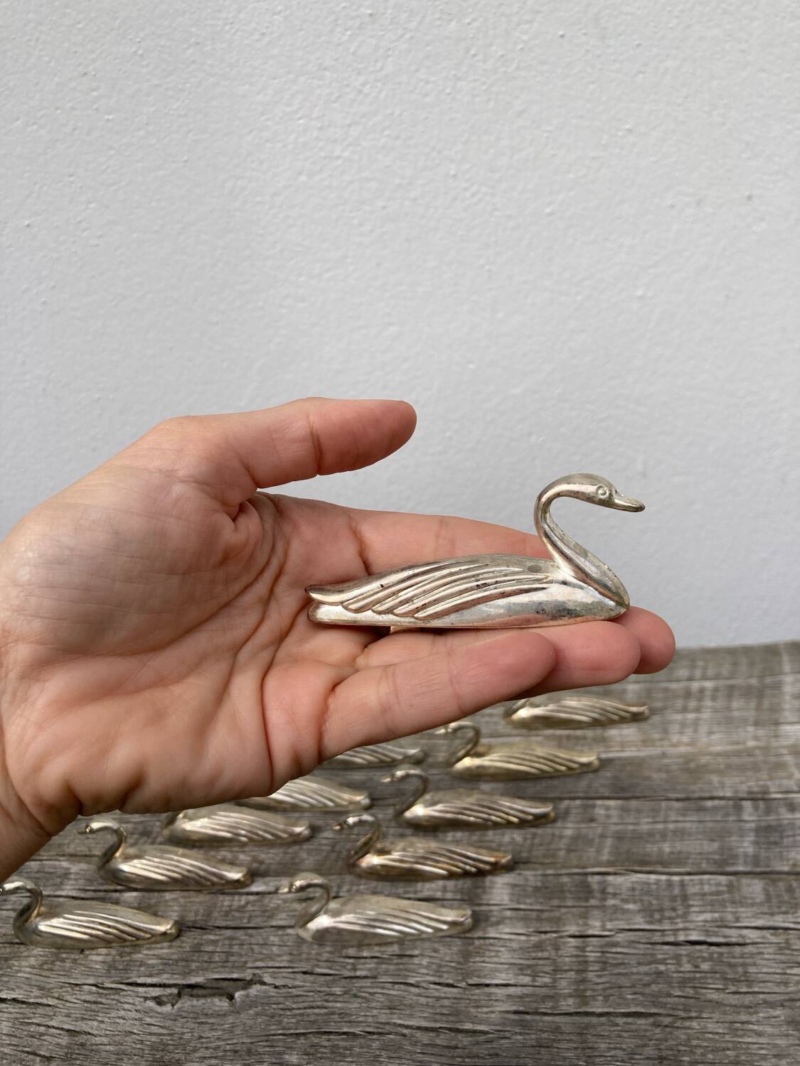 12 duck knife holders in silver metal