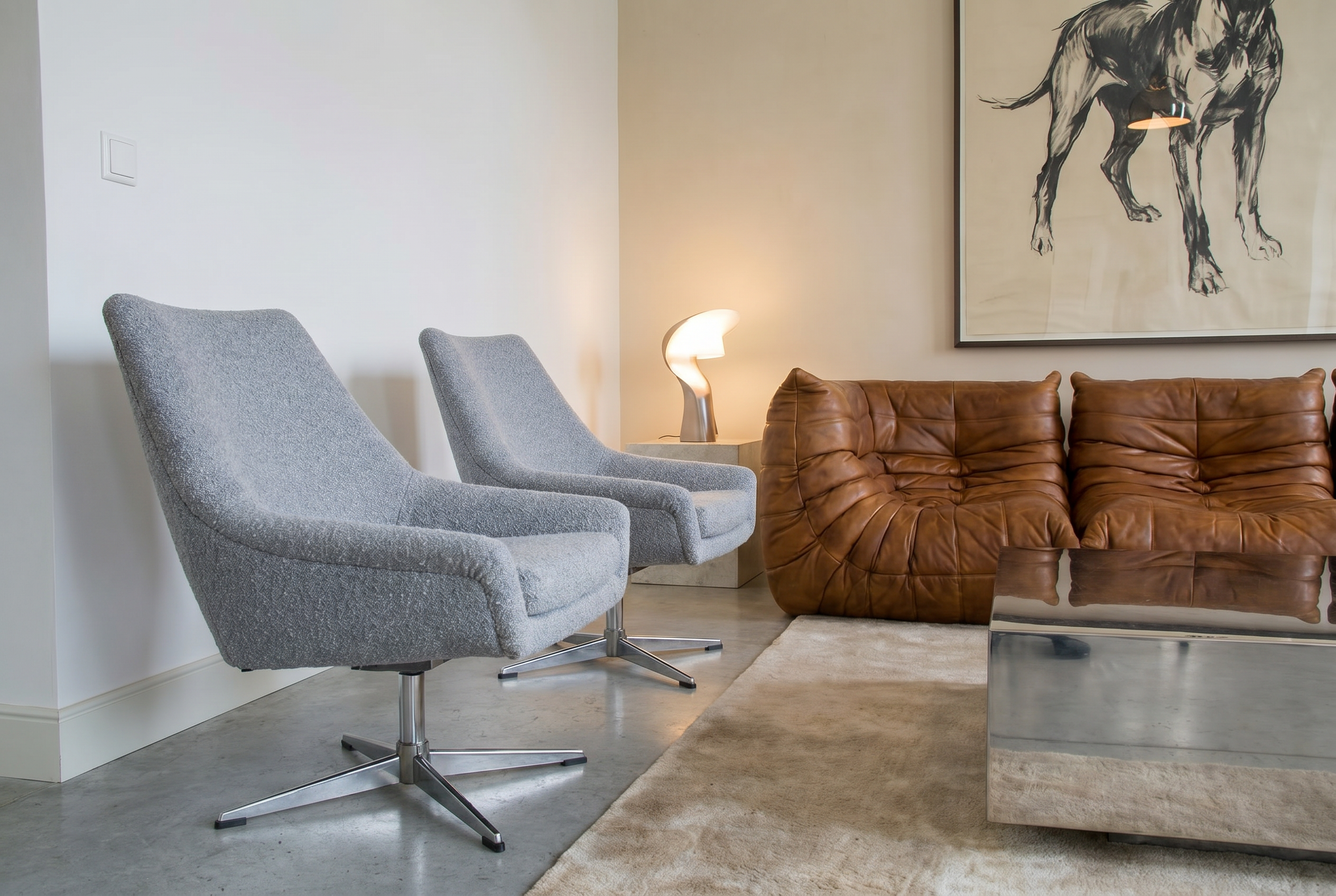 Modernist shell armchairs from the 1970s.