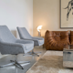 Modernist shell armchairs from the 1970s.