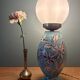 Lampe vintage en céramique et opaline blanche.