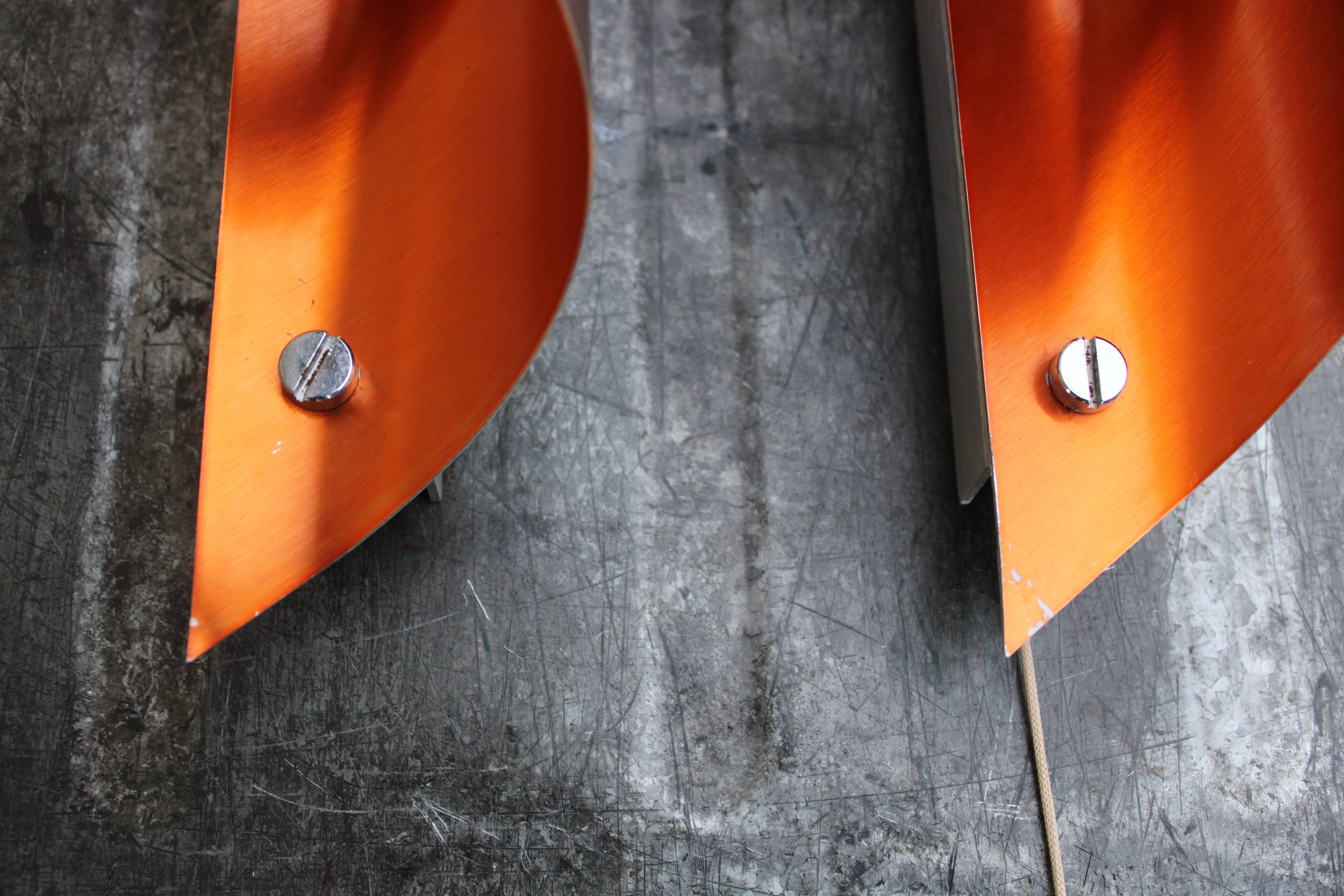 Pair of orange brushed aluminum wall light